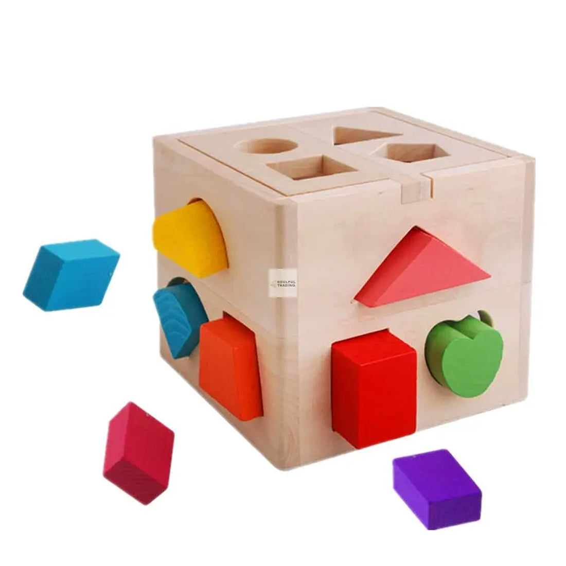Soulful Trading Montessori Wooden Intelligence Box with various colored blocks including a triangle, square, and apple shapes scattered around it.