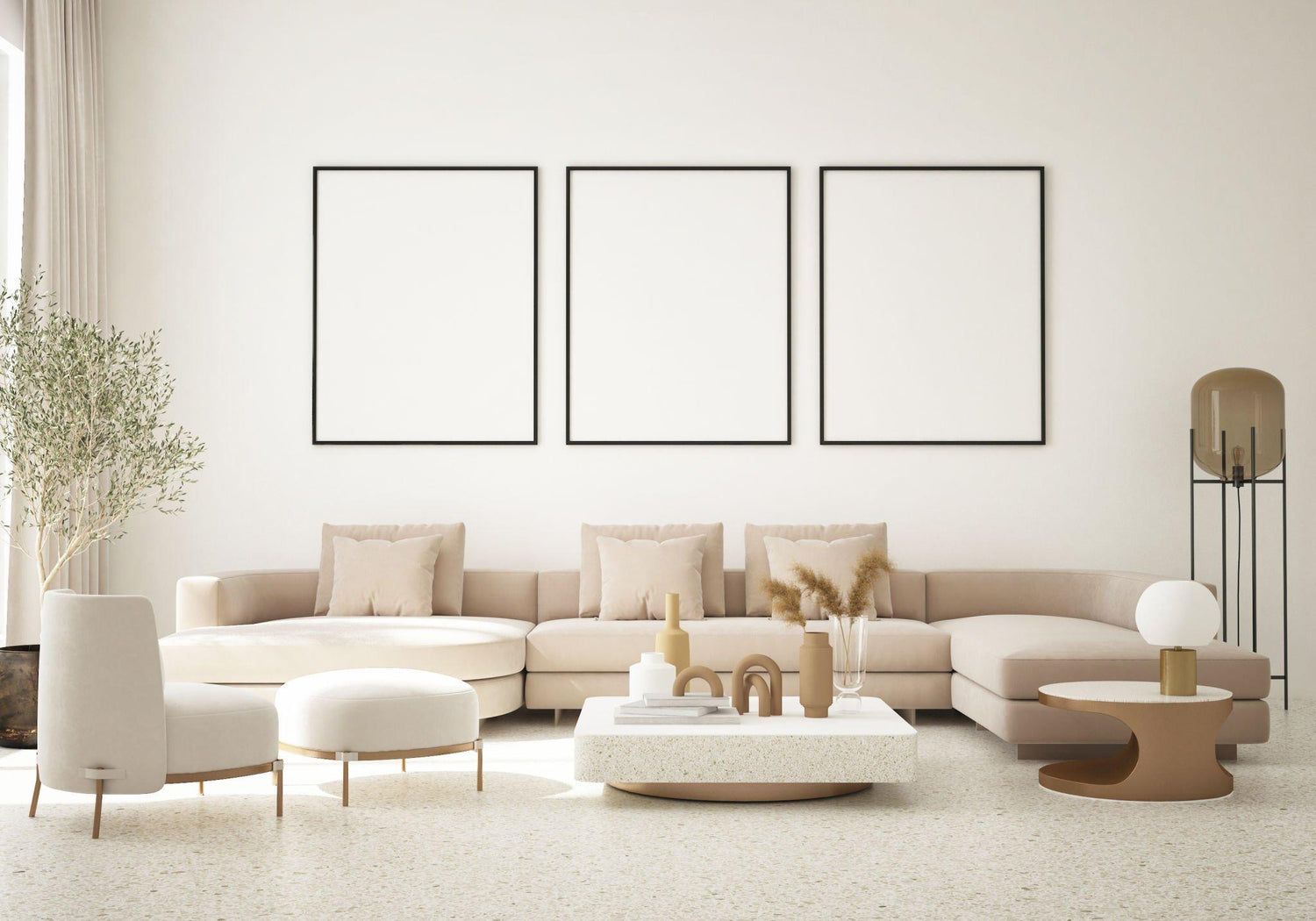 A modern living room featuring a neutral-toned sectional sofa, three framed artworks on the wall, a minimalist coffee table, and an elegant white armchair.