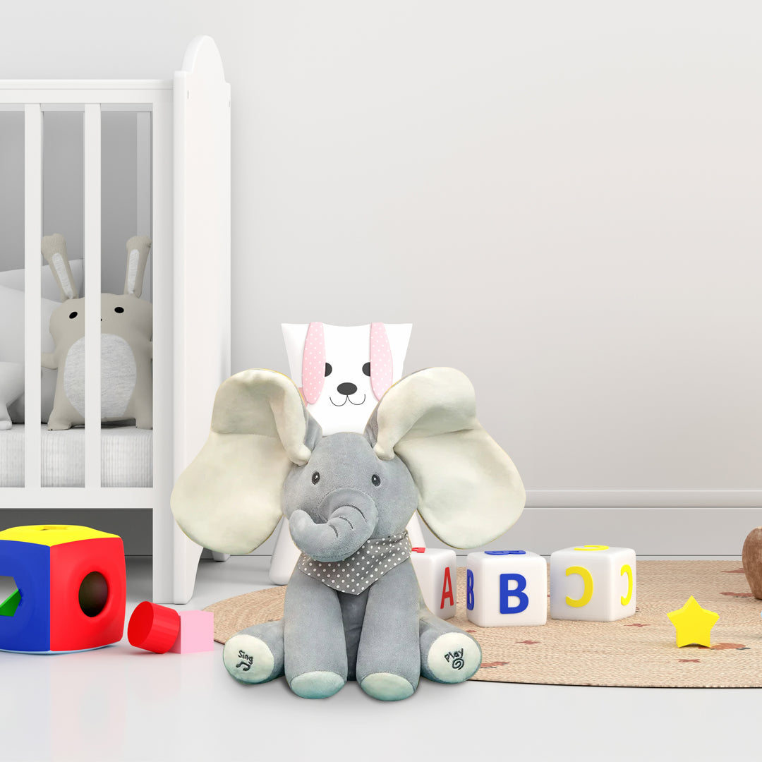 A Soulful Trading Peek-a-Boo Musical Elephant toy in a child&