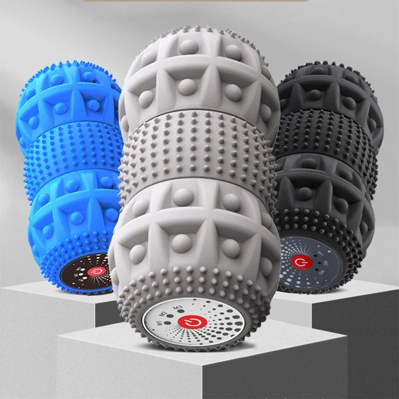 A display of six spiky Soulful Trading Myofascial Roll Massage Rollers in blue, grey, and black, each resting on individual pedestals.