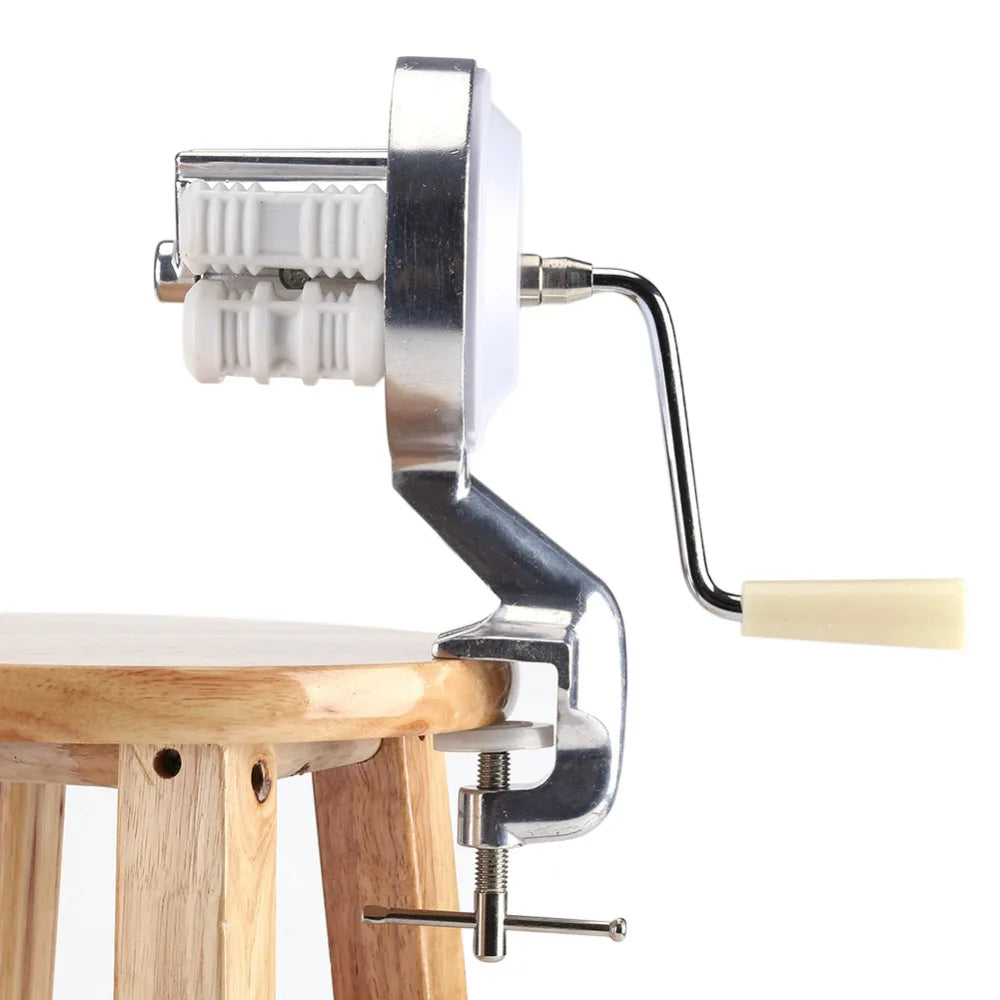 Authentic Soulful Trading Cavatelli Pasta Maker clamped to a wooden table, isolated on a white background.