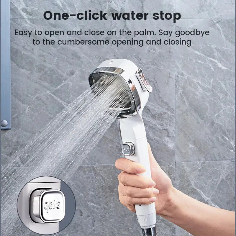 A hand holding a Soulful Trading 4-Mode Handheld Pressurized Shower Head with water flowing, against a tiled wall, featuring a button for one-click water stop.
