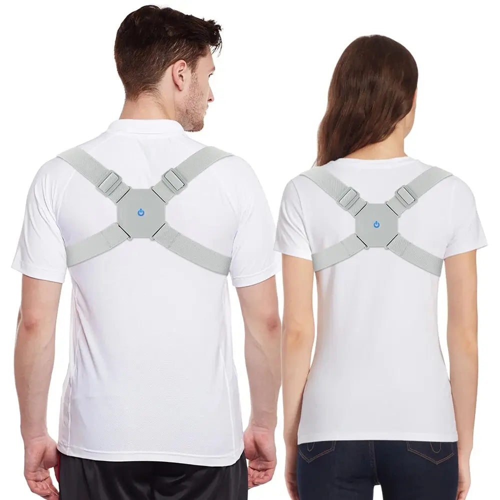 A man and a woman, both wearing white t-shirts and Soulful Trading Intelligent Posture Correctors, facing away from the camera, showing the back view of the braces designed to improve posture.