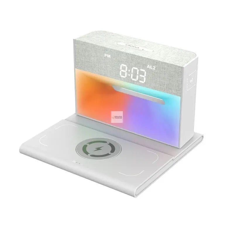 Modern Soulful Trading wireless charging station displaying 8:03 pm with colorful ambient lighting and a built-in Qi-enabled wireless charging pad for smartphones.