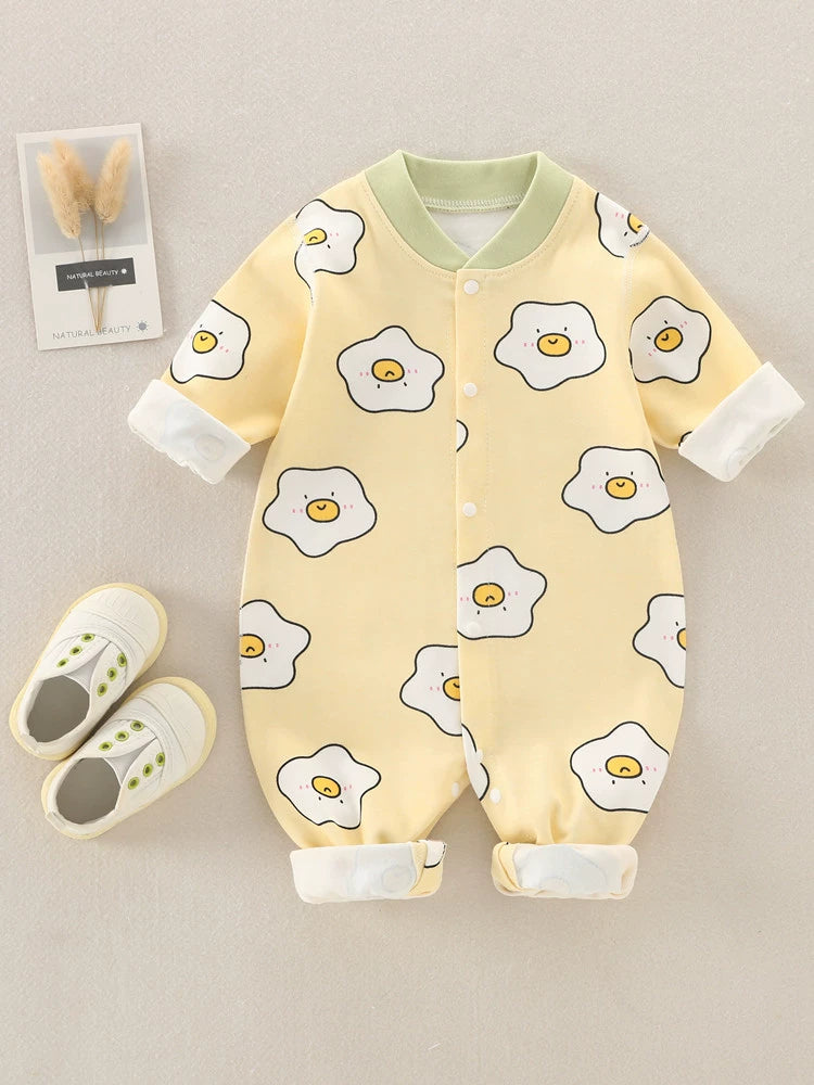 Spring &amp; Summer Ultra Soft Cotton Baby Romper by Soulful Trading with a yellow and green chick print, displayed with matching shoes and a &