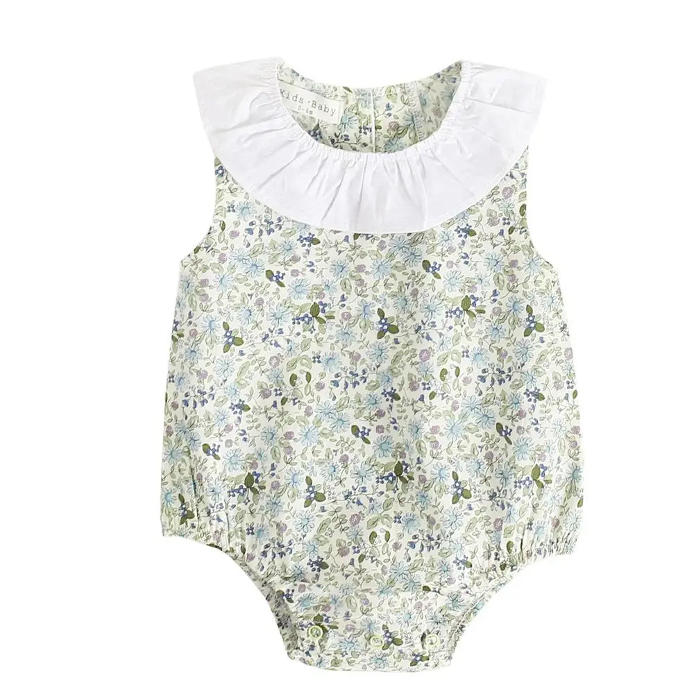 Floral print Spring &amp; Summer Baby Onesie with a white ruffle collar, displayed on a white background by Soulful Trading.