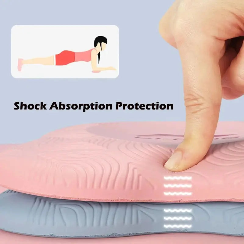 A finger pressing on a stack of three Fitness-8 shock-absorbent exercise mats in pink, blue, and gray, with an illustration above showing a person doing a plank. The text reads &quot;shock absorption.